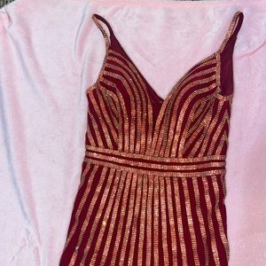Burgundy dress with gold and red studs size small excellent condition